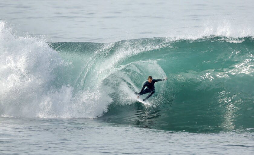 Commentary: Surfing, by is social Let us surf during coronavirus outbreak. San Diego Union-Tribune
