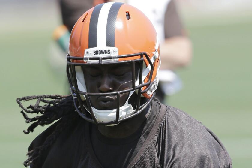 Cleveland's Isaiah Crowell runs the ball during practice on June 1.
