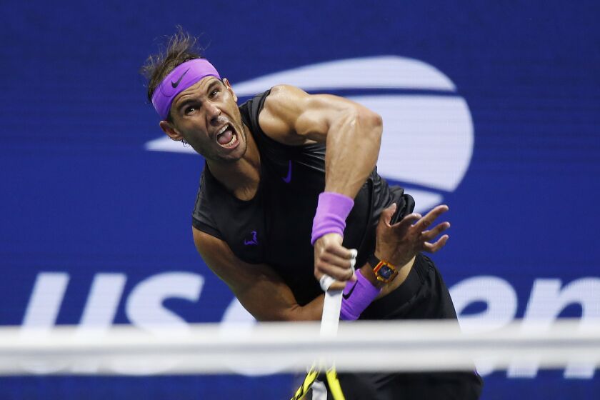 Rafael Nadal, of Spain, serves to Marin Cilic, of Croatia, during the fourth round of the U.S. Open tennis tournament, Monday, Sept. 2, 2019, in New York. (AP Photo/Jason DeCrow)