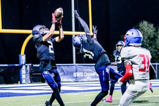 Marquis Gallegos of Sierra Canyon makes game-ending interception to preserve his team's 35-28 win over Serra.