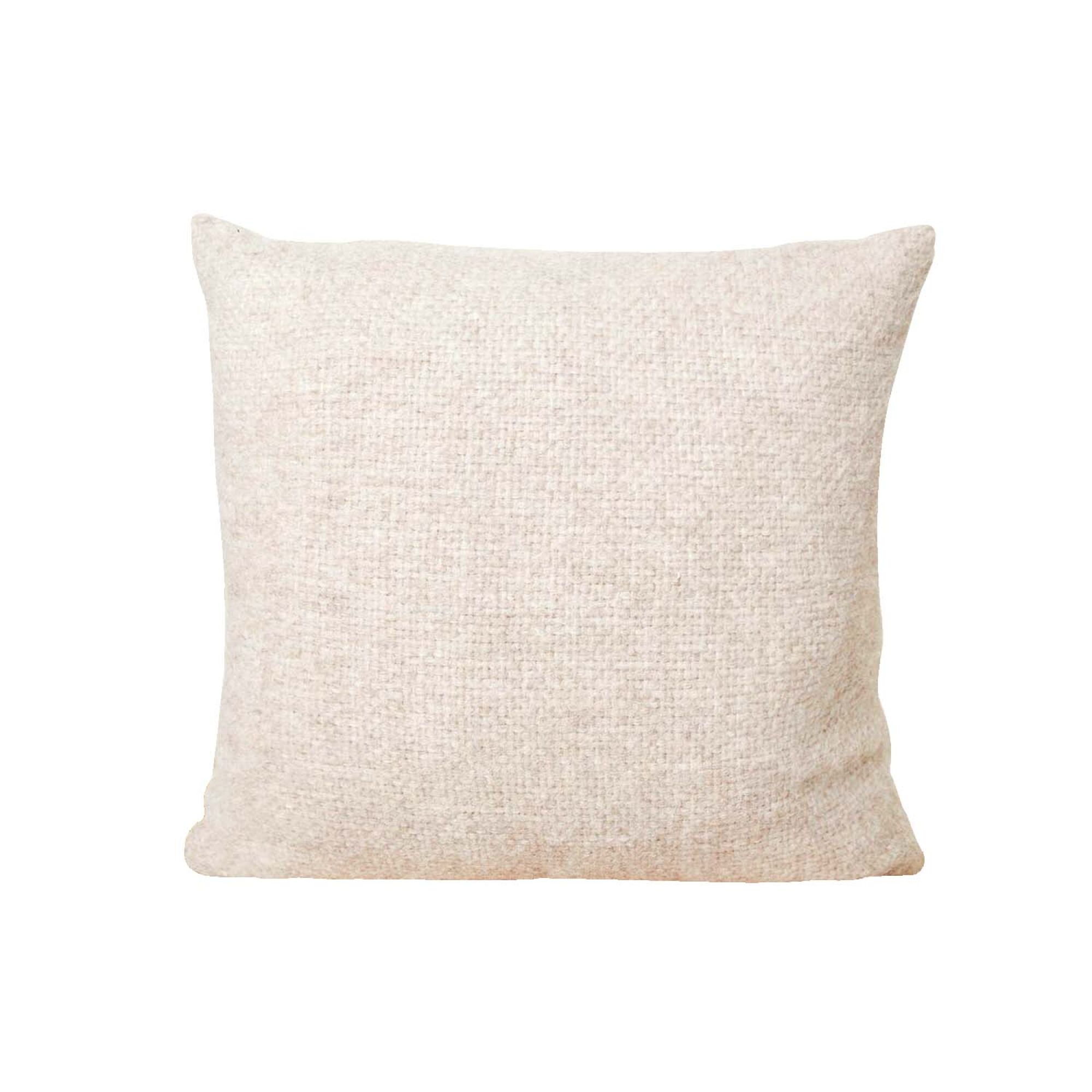 An alpaca basketweave pillow.