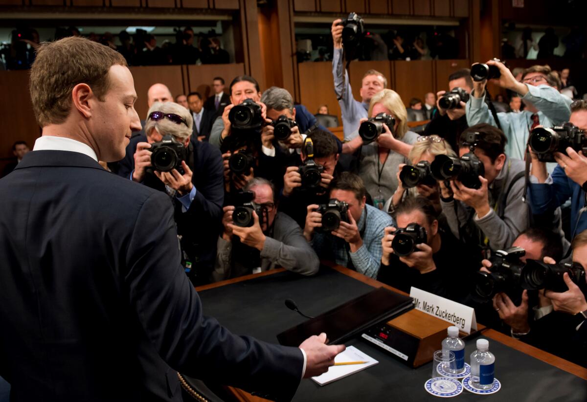 Facebook Chief Executive Mark Zuckerberg prepares to testify at a Senate hearing in Washington, D.C., in 2018.