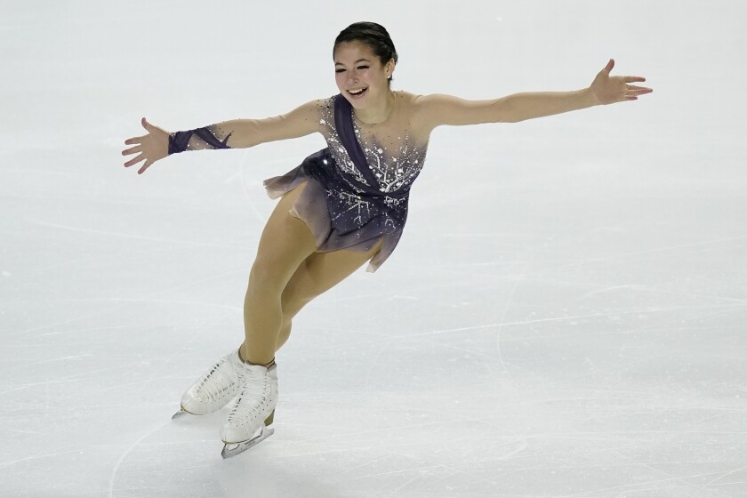 FILE - Alysa Liu performs during the women's free skate at the U.S. Figure Skating Championships, Friday, Jan. 15, 2021, in Las Vegas. Alysa Liu just might be the best hope America has to knock one of the Russian women off the figure skating podium at the Beijing Olympics. But first, the 16-year-old from California has to navigate the U.S. championships in Nashville, where she won the first of her two titles at the sprightly age of 13 but finished a disappointing fourth a year ago. (AP Photo/John Locher, File)