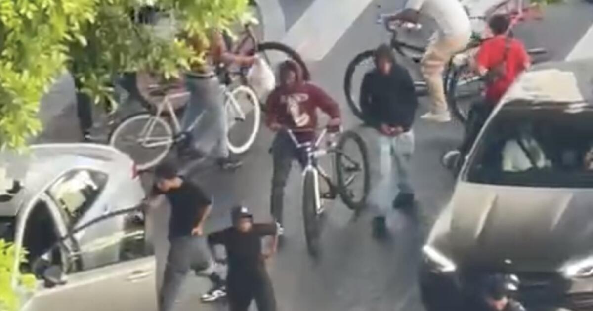 Watch: Driver violently attacked by group of teenagers on bikes in downtown L.A.