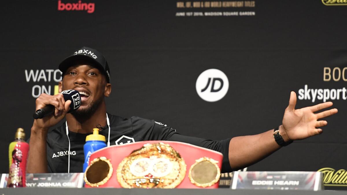 Anthony Joshua fields questions during a news conference Thursday ahead of his world heavyweight title fight against Andy Ruiz at the Beacon Theatre in New York City.
