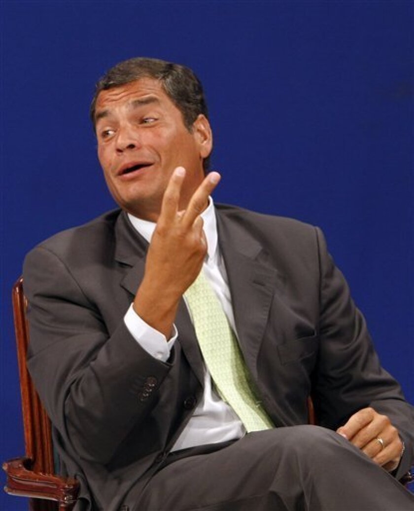 Ecuador's President Rafael Correa gestures after listening favorable reports about a referendum he proposed as he is interviewed during a TV broadcast at GamaTV station in Quito, Ecuador, Saturday, May 7, 2011. An exit poll indicates Ecuador's voters have roundly approved 10 ballot questions proposed by Correa that critics say could inhibit press freedom and lessen the judiciary's independence. (AP Photo/Dolores Ochoa)