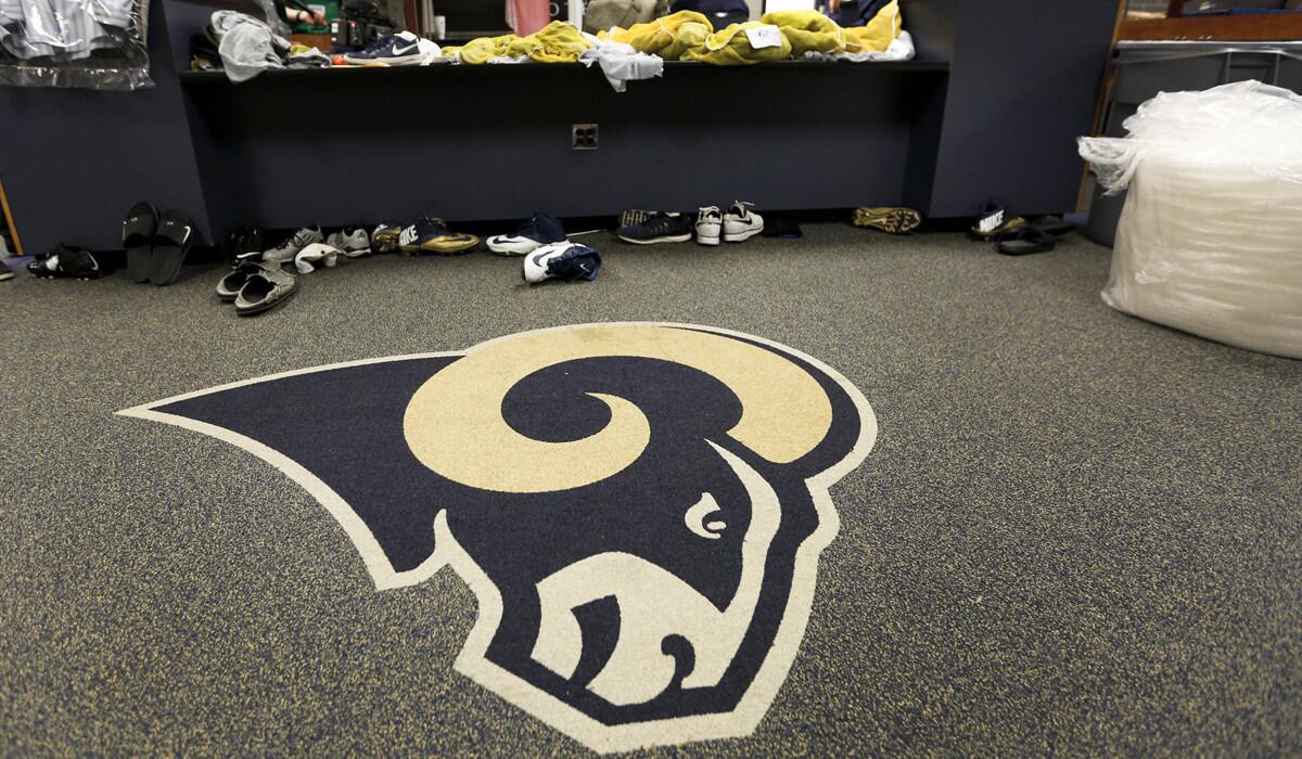 The Rams locker room in St. Louis is almost empty now while packing boxes and moving vans are being loaded with equipment, office furniture and football gear for the team's move to Los Angeles.