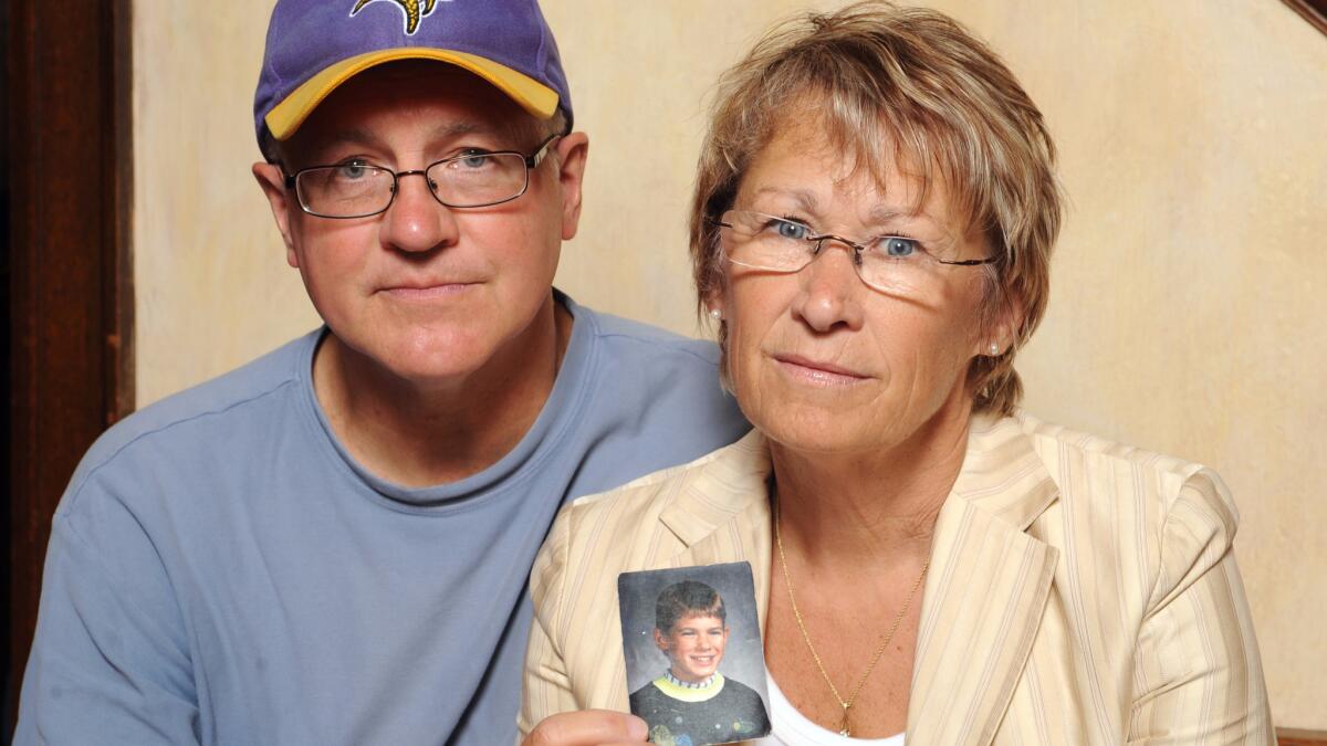 Patty and Jerry Wetterling with a photo of their son Jacob Wetterling, who was abducted in October 1989 in St. Joseph, Minn.