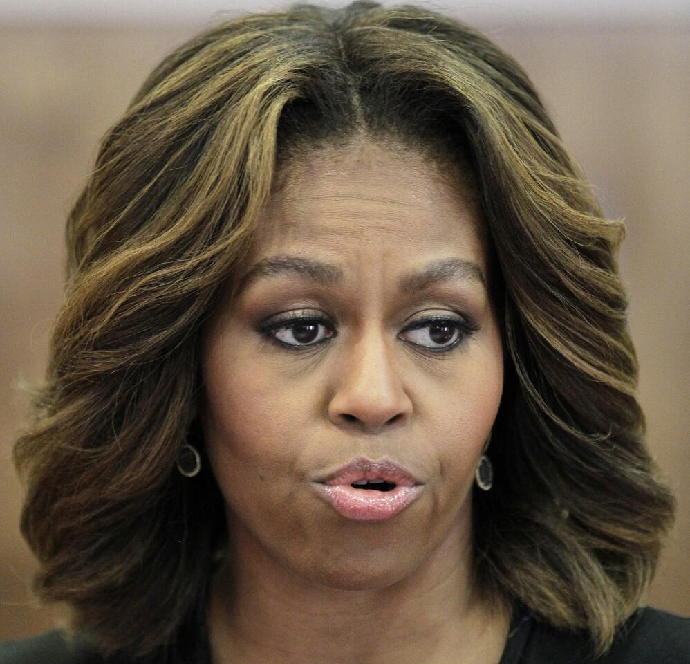 First Lady Michelle Obama unveiled her new look during official duties this week.