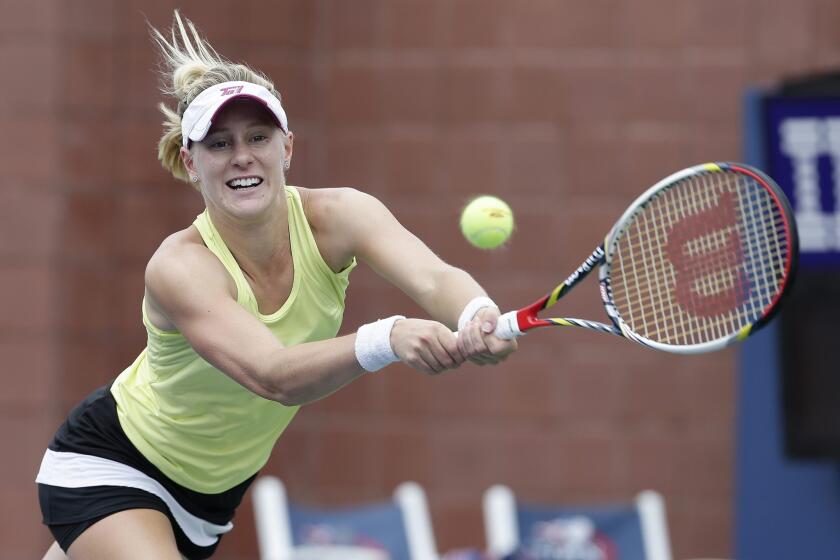 Alison Riske hits a return during her upset victory over Petra Kvitova at the U.S. Open on Saturday.