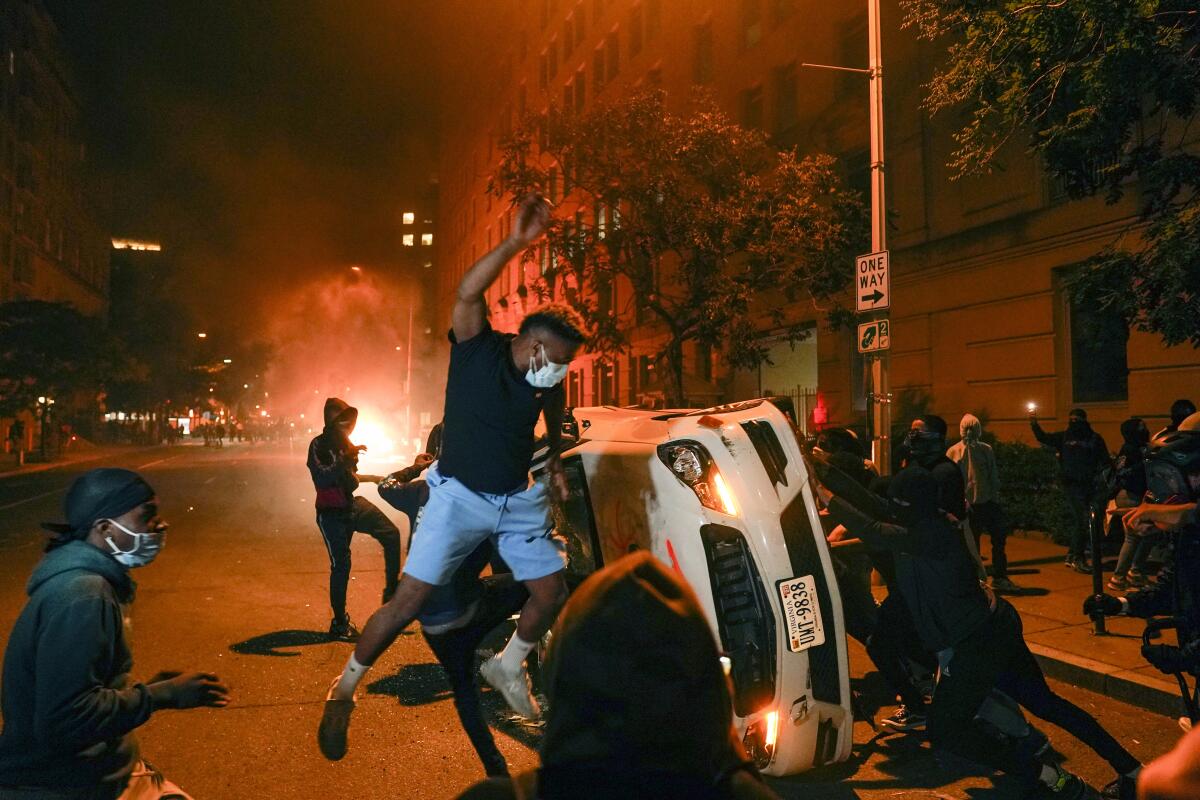 Protester vandalizes car near the White House