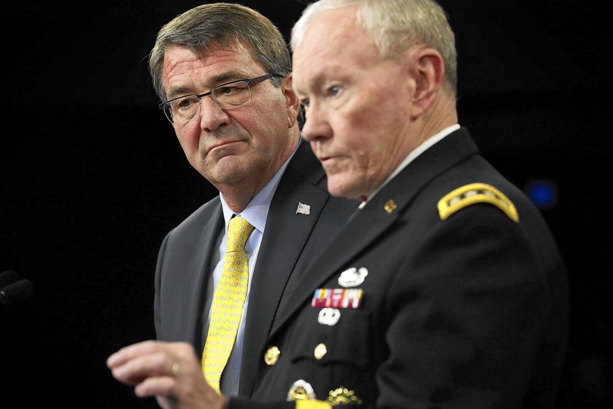 Secretary of Defense Ashton Carter and Gen. Martin Dempsey, chairman of the Joint Chiefs of Staff, speak Thursday at a Pentagon news conference.