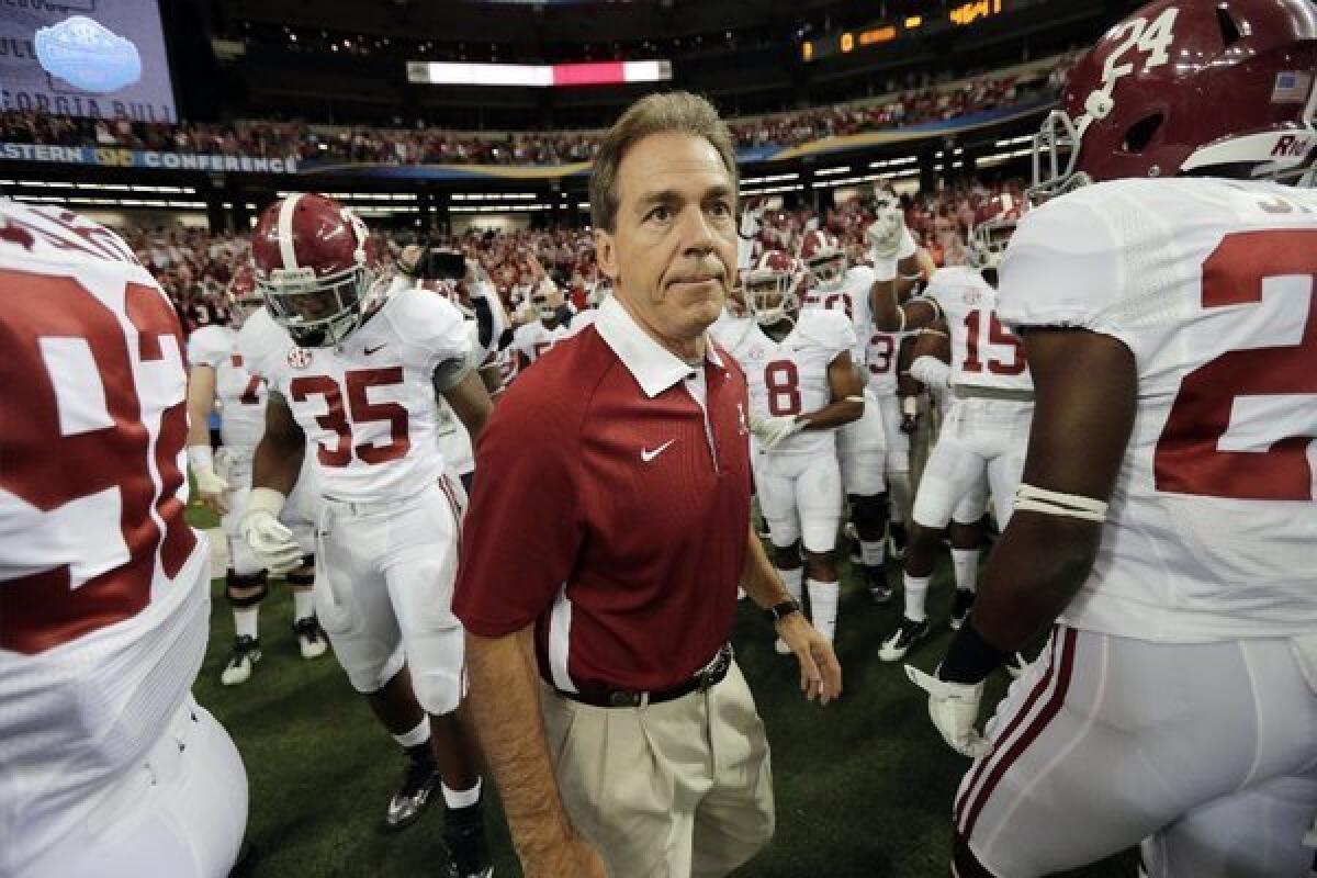 Nick Saban, above, and Ron Jaworski probably won't be having Christmas dinner together.