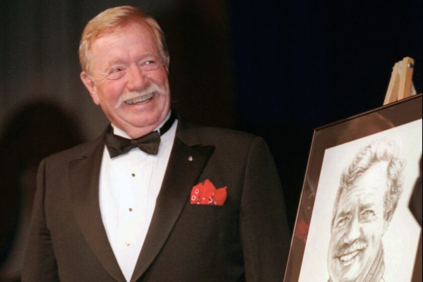 FILE - Retired Air Force Col. Joseph W. Kittinger Jr., smiles during his induction into the Aviation Hall of Fame, Saturday, July 19, 1997, in Dayton, Ohio. Kittinger, the U.S. Air Force pilot who held the record for the highest parachute jump for more than 50 years, died Friday, Dec. 9, 2022, in Florida at age 94. (AP Photo/Michael Heinz, File)
