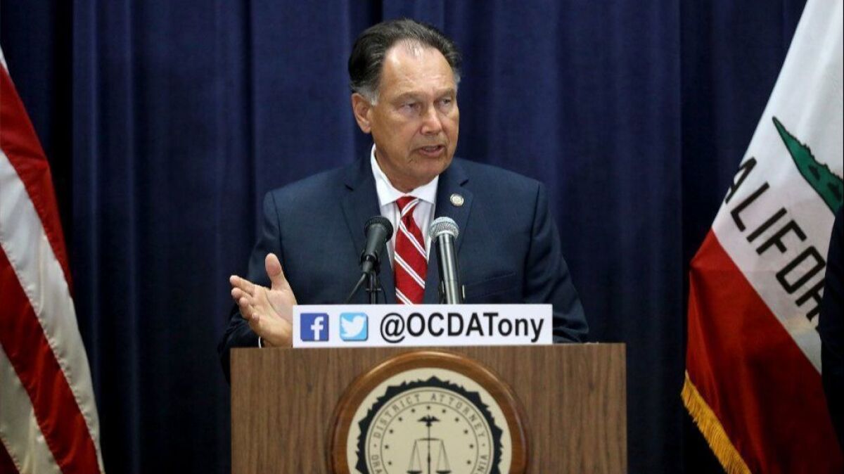 Then-Orange County District Attorney Tony Rackauckas speaks at a news conference in August 2018. The county has withdrawn a motion to have depositions from Rackauckas and his chief of staff sealed in a high-profile sexual-assault case involving a Newport Beach doctor and his girlfriend.