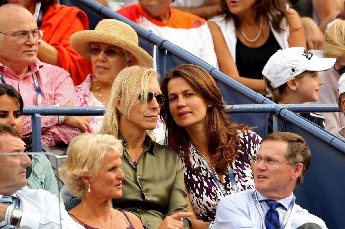 Martina Navratilova and Julia Lemigova watch a match between Rafael Nadal and Richard Gasquet on Sept. 7 at the U.S. Open.