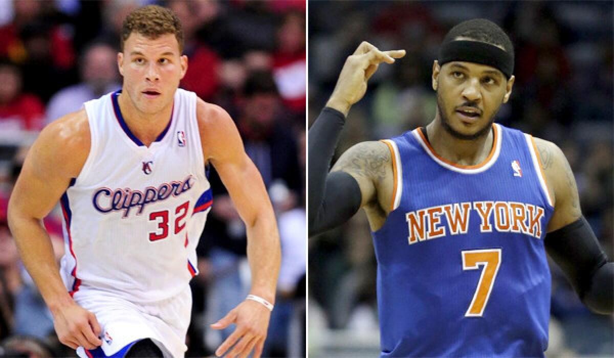 Coach Doc Rivers shot down a report that the Clippers have discussed the possibility of trading Blake Griffin, left, to the New York Knicks for Carmelo Anthony, right.