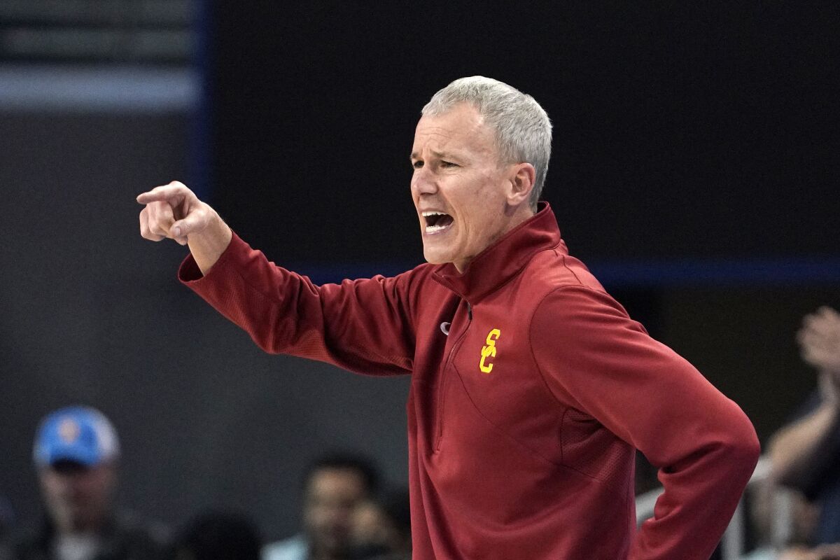 USC coach Andy Enfield yells and points during a game against UCLA in March.