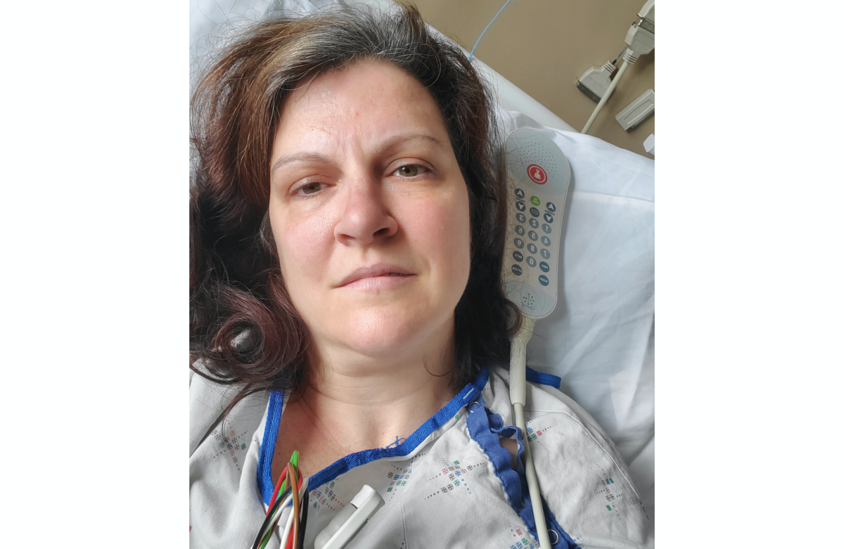 Darlene Gildersleeve in a hospital bed in Manchester, N.H. She thought she had recovered from COVID-19, but then she had two strokes.