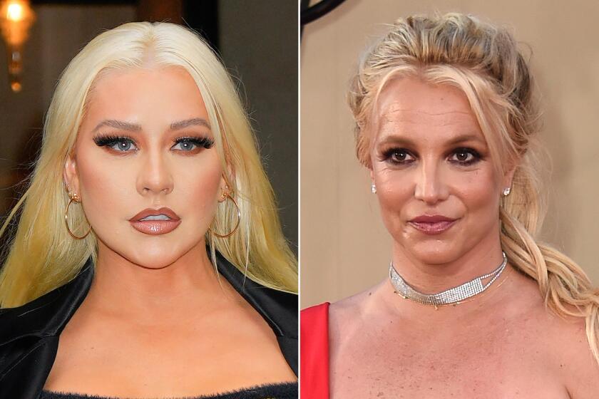 members in the band ghost Left, Christina Aguilera on June 28, 2023 in New York City. Right, Britney Spears in Hollywood on July 22, 2019.