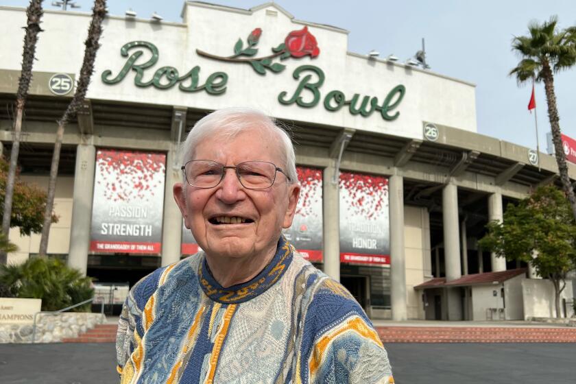 Reynolds Crutchfield, 93, stands in front of the Rose Bowl in December 2023.