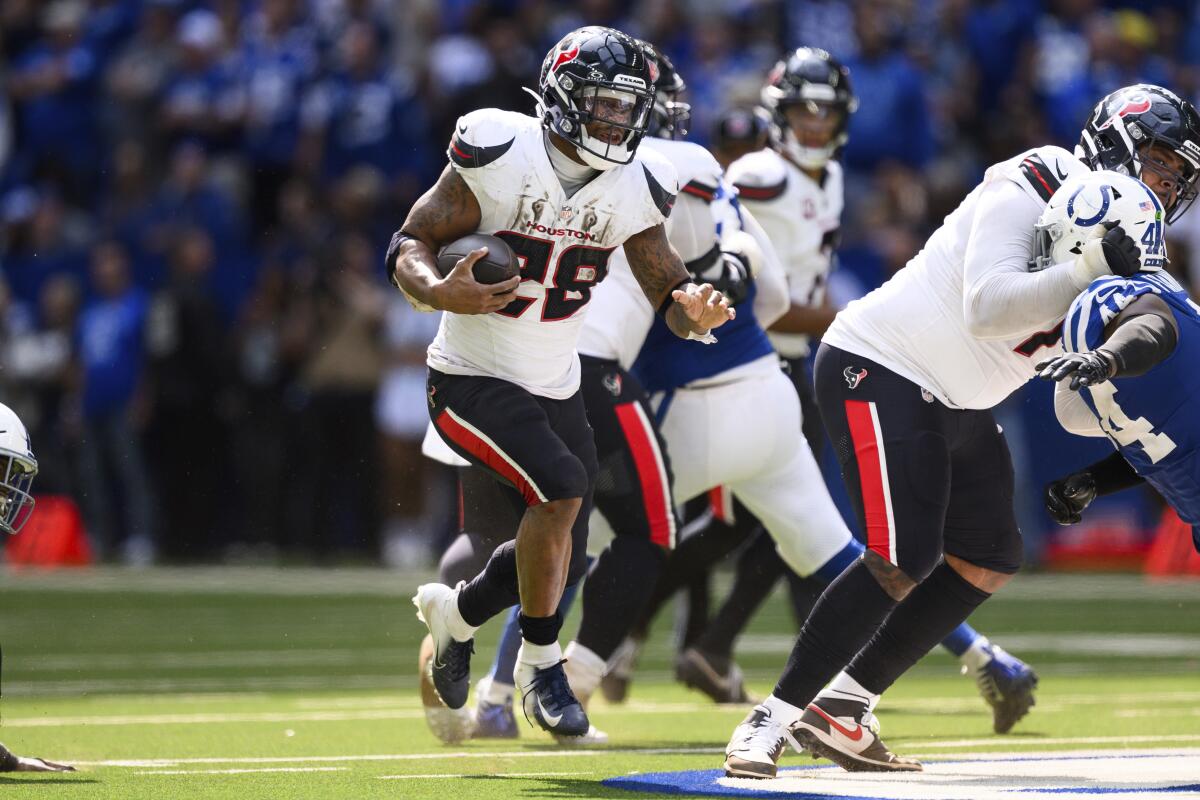 The Texans' Joe Mixon (28) runs against the Colts in Week 1.