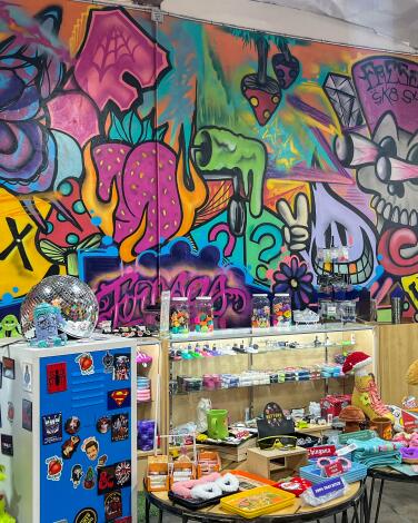 Colorful mural on a wall in a skate shop