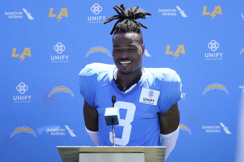 Los Angeles Chargers safety Derwin James Jr. (3) speaks to reporters after a combined NFL practice with the Dallas Cowboys at the Los Angeles Rams' practice facility in Costa Mesa, Calif. Wednesday, Aug. 17, 2022. (AP Photo/Ashley Landis)