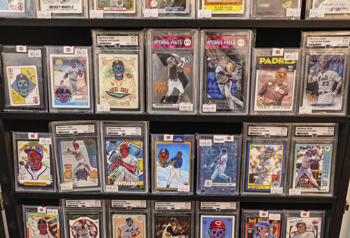 Some of artist Isaac Coronado's hand-painted vintage baseball cards.