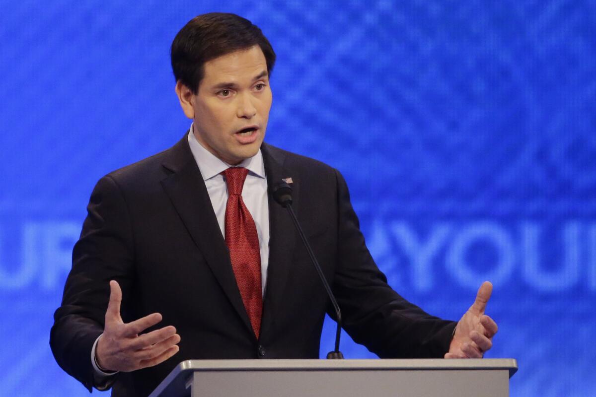 Sen. Marco Rubio of Florida answers a question during the Republican presidential primary debate on Saturday at St. Anselm College in Manchester, N.H.