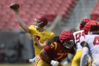 Los Angeles, CA - April 20: USC quarterback Miller Moss, #7, throws the ball during.