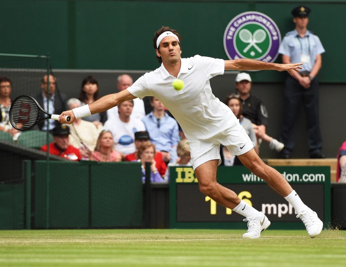 Roger Federer of Switzerland defeated Gilles Muller of Luxembourg 6-3, 7-5, 6-3 in a second round match on Thursday at the All England Lawn Tennis Club.