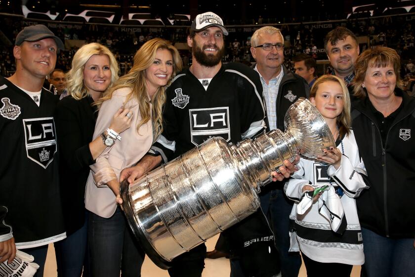Jarret Stoll celebrates with family and friends, including his future wife Erin Andrews, after winning his second Stanley Cup with the Kings in 2014.