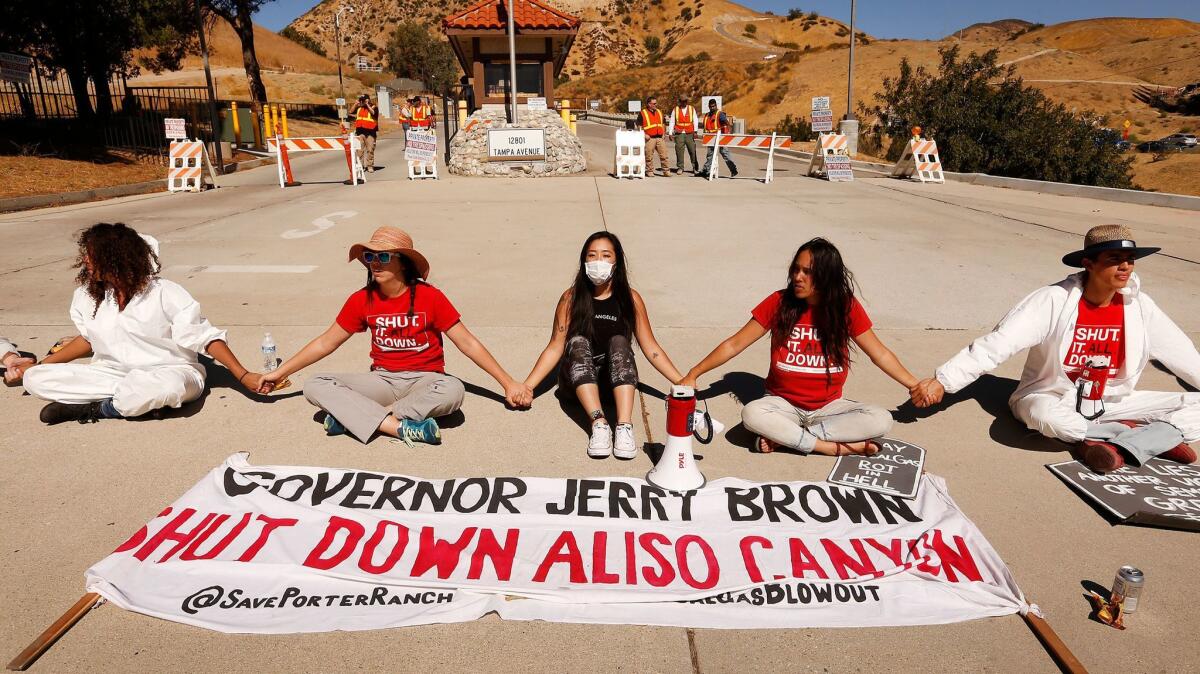Protesters stage a sit-in at the entrance to Southern California Gas Co.'s Aliso Canyon storage facility in Porter Ranch in October, marking the two-year anniversary of the largest methane leak in U.S. history.