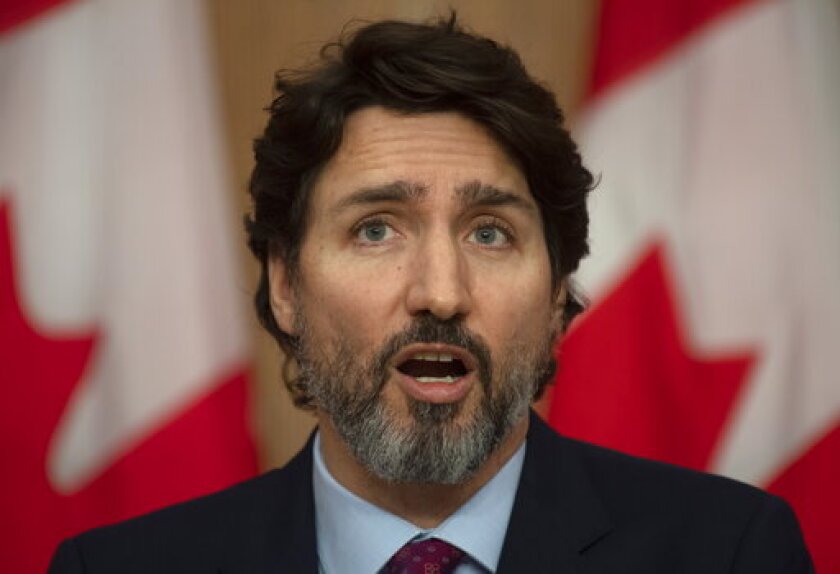 Prime Minister Justin Trudeau speaks at a news conference in Ottawa, Monday, Dec. 7, 2020. (Adrian Wyld/The Canadian Press via AP)