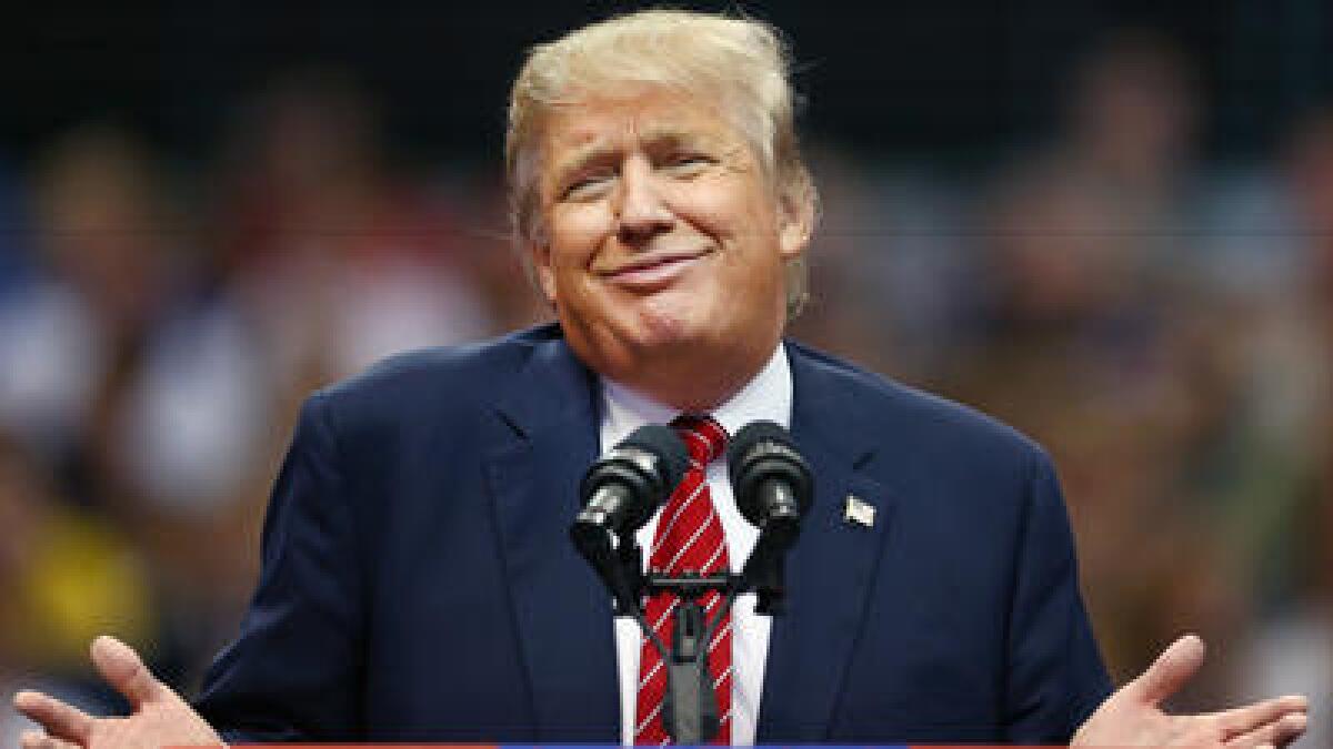 Republican presidential candidate Donald Trump speaks during a Dallas campaign rally in September 2015.