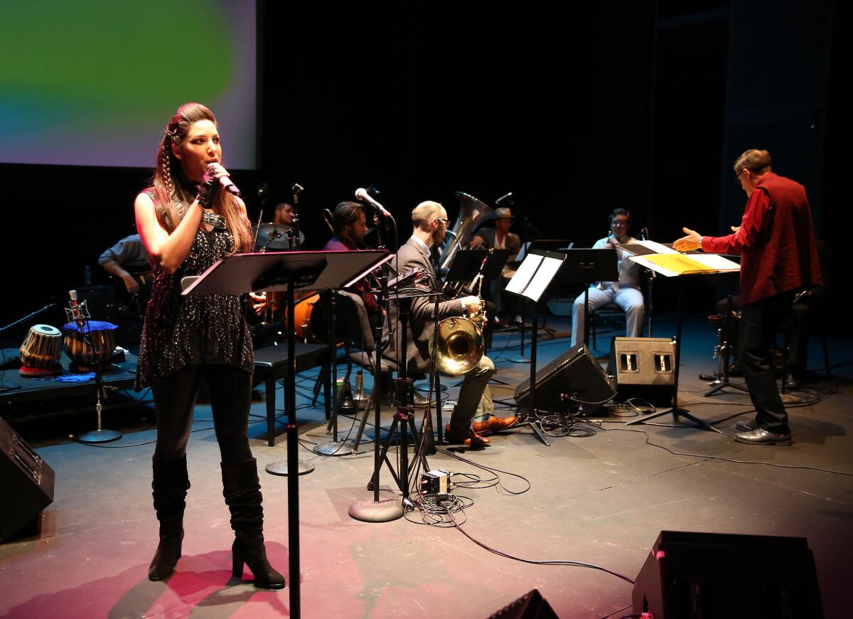 Meltem Ege sings while David Rosenboom conducts "Battle Hymn for Insurgent Arts" on Saturday at REDCAT in downtown L.A.