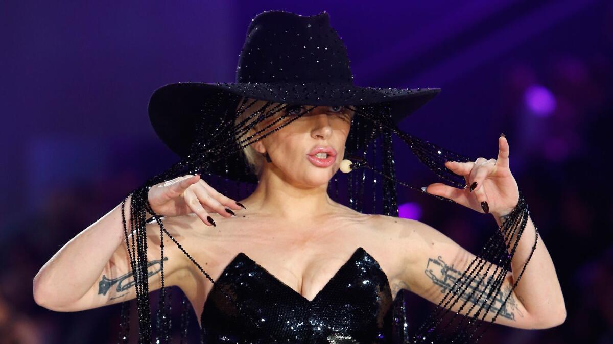 Lady Gaga performs on the runway with Swarovski crystals during Victoria's Secret Fashion Show on Nov. 30 in Paris.