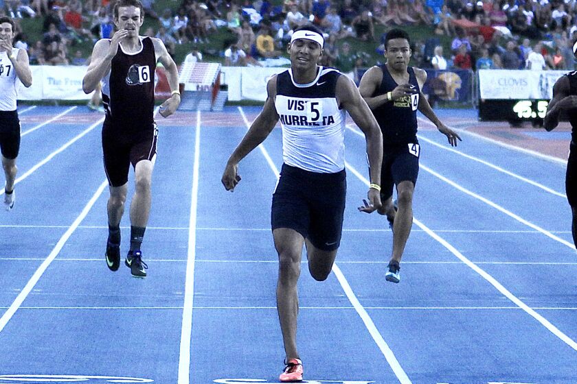 Vista Murrieta senior Michael Norman wins the 400-meter dash in 45.77 seconds to repeat as champion at the CIF state track and field championships in Clovis.