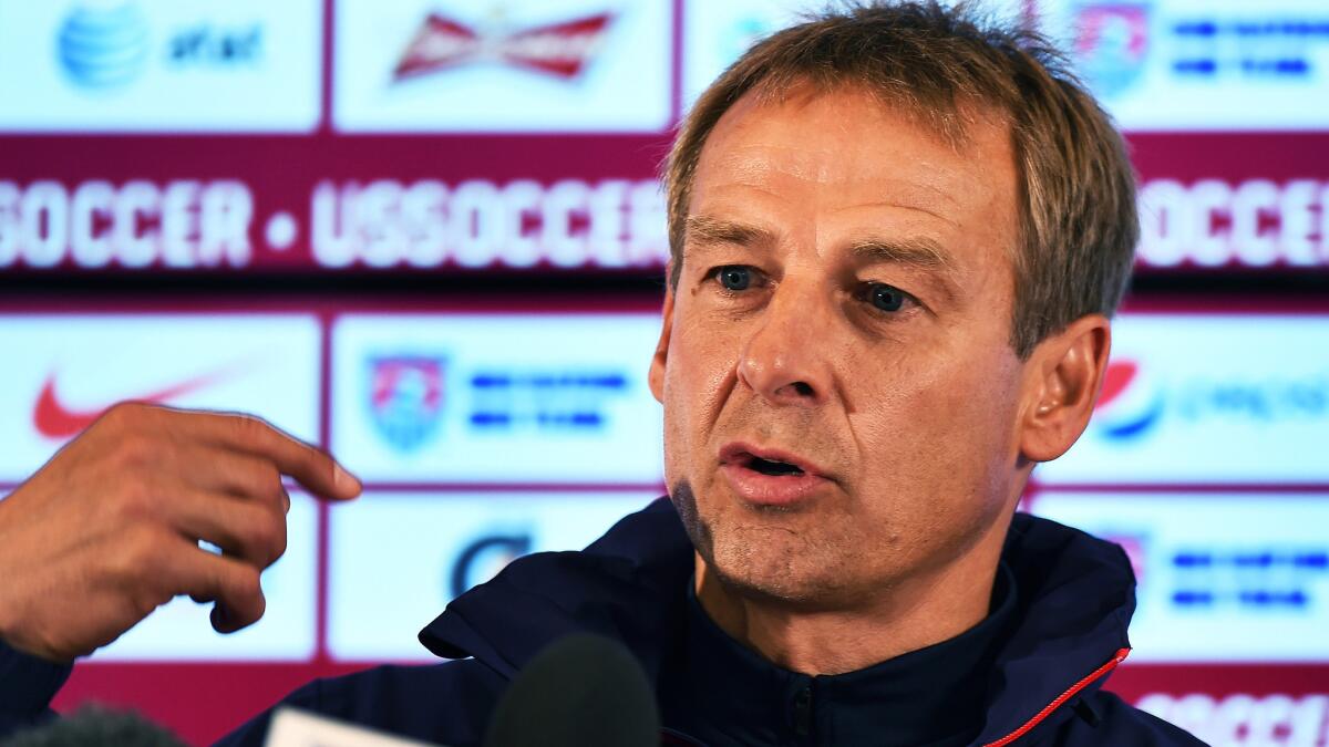 U.S. Coach Juergen Klinsmann says it would be unrealistic to think the team has a legitimate shot at winning the World Cup this year.