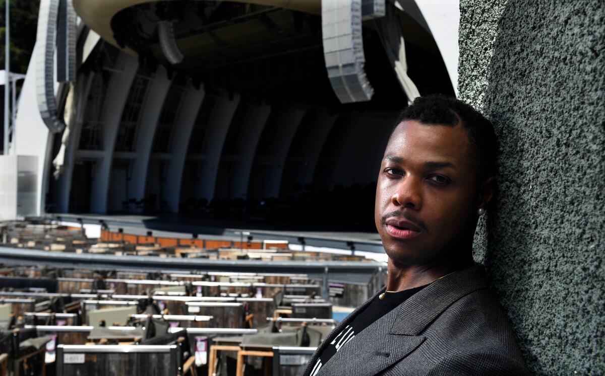 Close-up of a man to the side of the Hollywood Bowl stage.