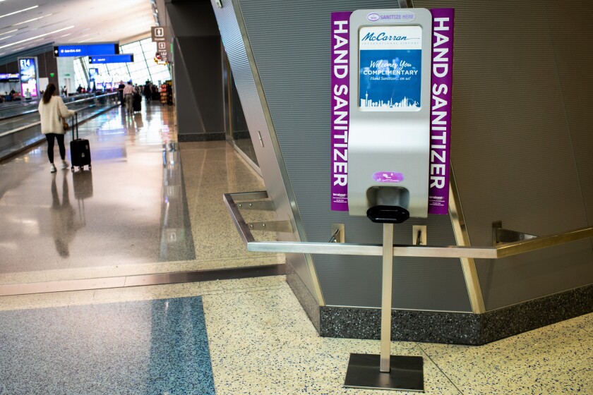 A hand sanitizer station in McCarran International Airport in Las Vegas.