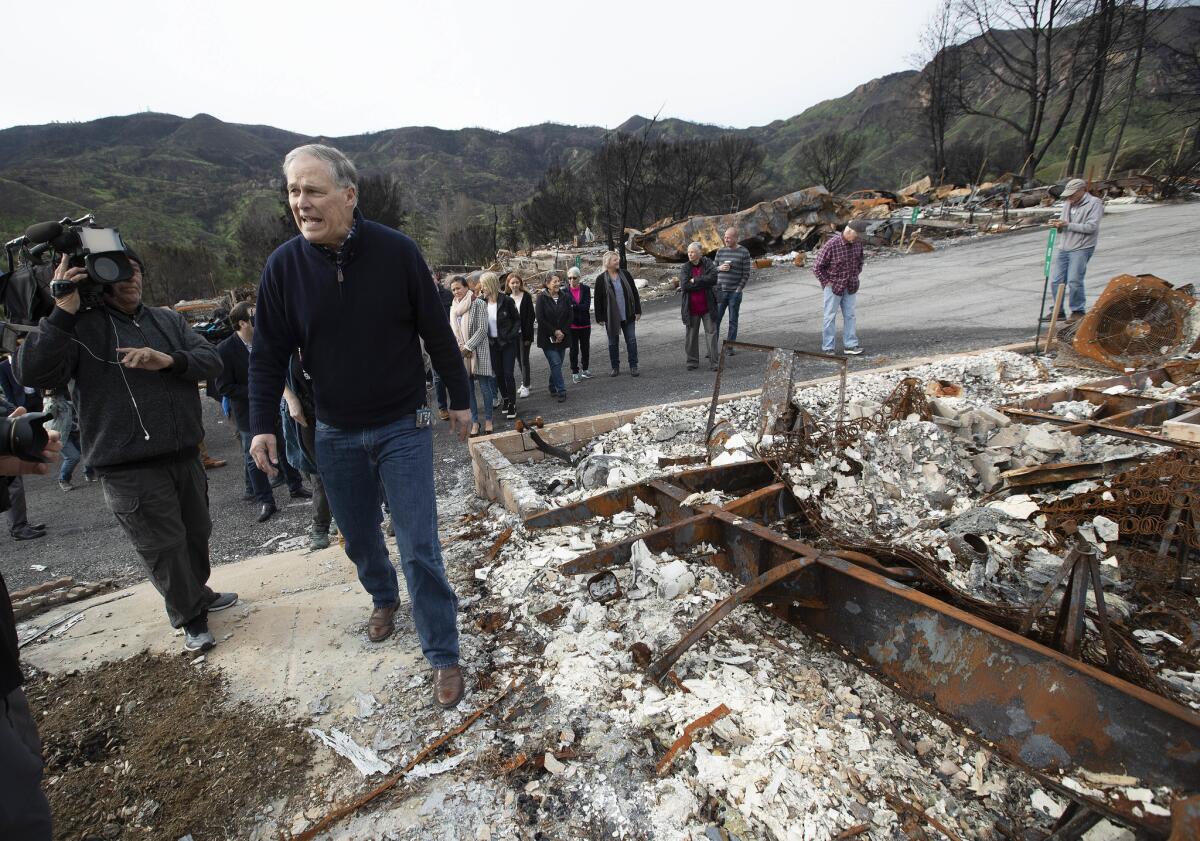 Gov. Jay Inslee of Washington tours Seminole Springs mobile home park in Agoura Hills.