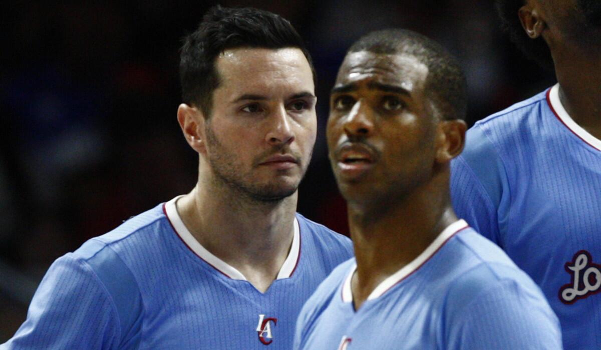 Clippers teammates J.J. Redick, left, and Chris Paul.