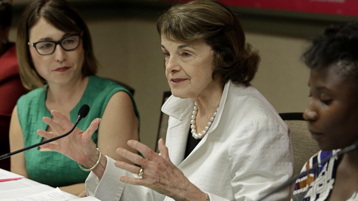 Sen. Dianne Feinstein (D-Calif.) speaks at a gathering for Planned Parenthood with Crystal Strait, left, chief executive officer and president of Planned Parenthood Affiliates of California on Thursday, May 31, in Sacramento.