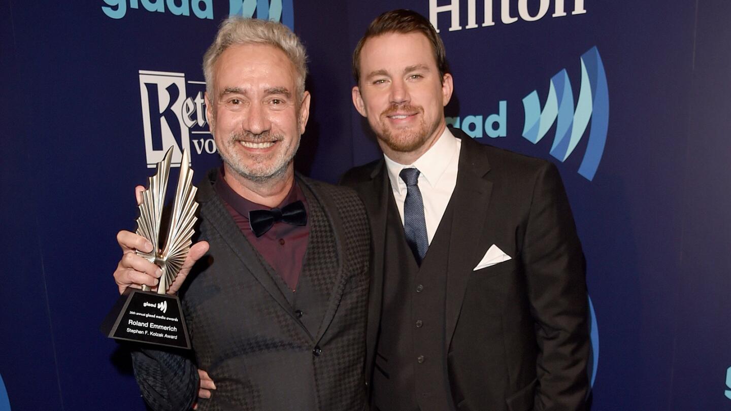 Director Roland Emmerich, left, and actor Channing Tatum pose with the Stephen F. Kolzak Award during the 26th GLAAD Media Awards at the Beverly Hilton Hotel in Beverly Hills.