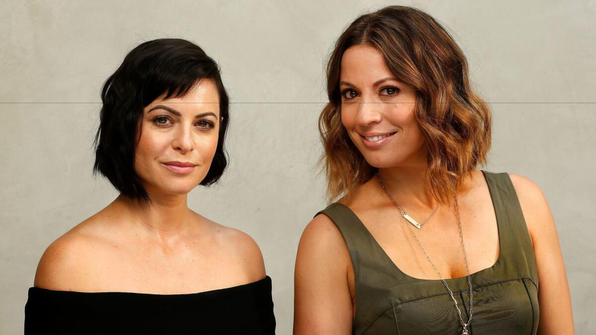 Sophia Amoruso, left, who wrote the bestselling book "#Girlboss," and Kay Cannon, executive producer and showrunner of the new Netflix series "Girlboss," at Cannon's home in Studio City.