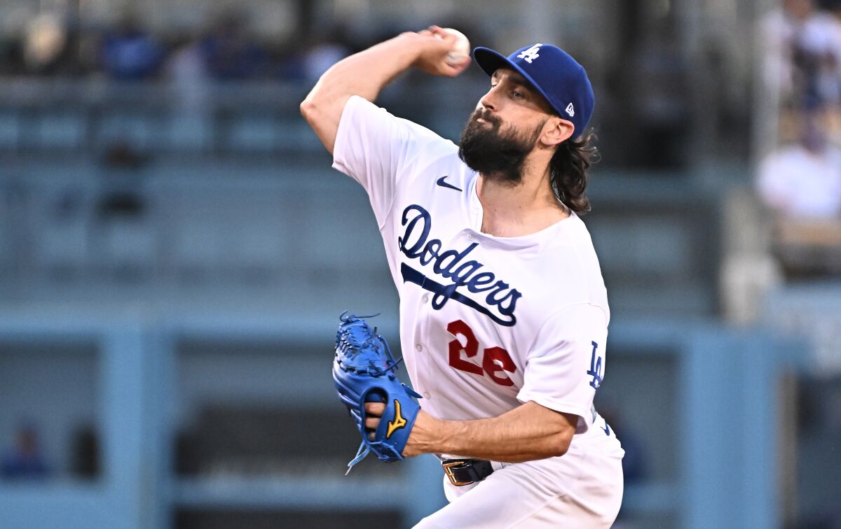 Dodgers pitcher Tony Gonsolin throws a pitch against the San Francisco Giants.