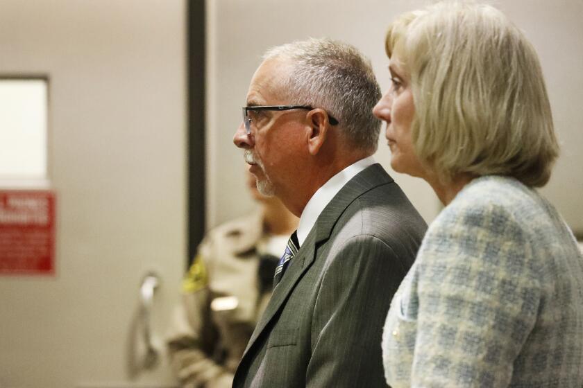 LOS ANGELES, CA - JUNE 26, 2019 - Dr. James Heaps, right, a former UCLA obstetrician-gynecologist appears in the Airport Branch Courthouse for a hearing June 26, 2019 with his attorney's Andrew Reed Flier and Tracy Green, accused of sexually battering patients. (Al Seib / Los Angeles Times)