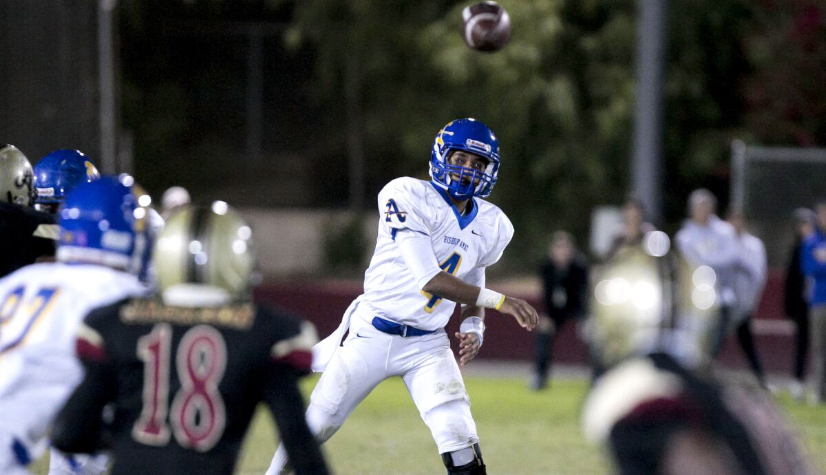 Bishop Amat quarterback Koa Haynes attempts a pass during the first half of a game against Bishop Alemany on Friday night.